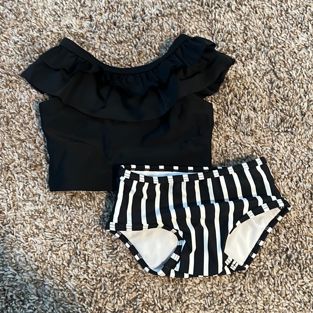 New without tags. Ruffle Butts 6-12 mo swim suit